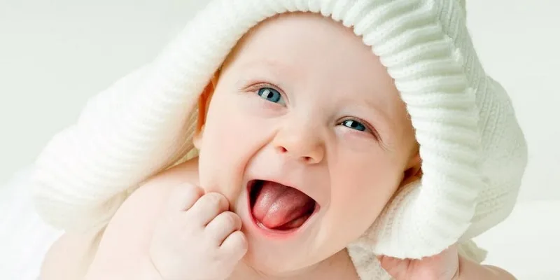 Điềm báo đại cát khi mơ thấy tiếng cười vô tư, rạng rỡ của trẻ thơ.